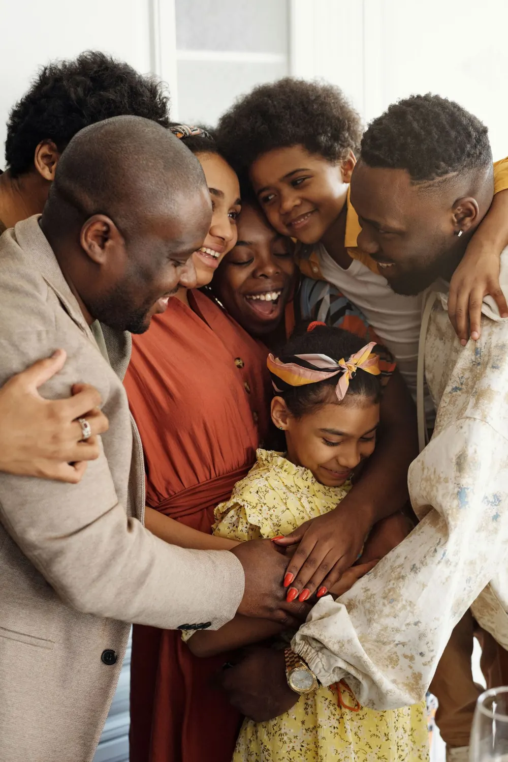 A family embracing and laughing together